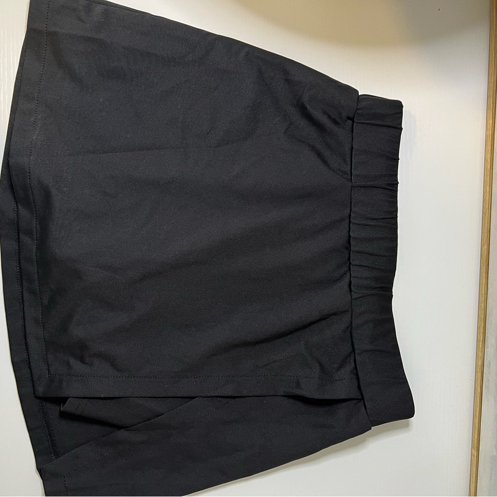 Athletic skirt with shorts built in
